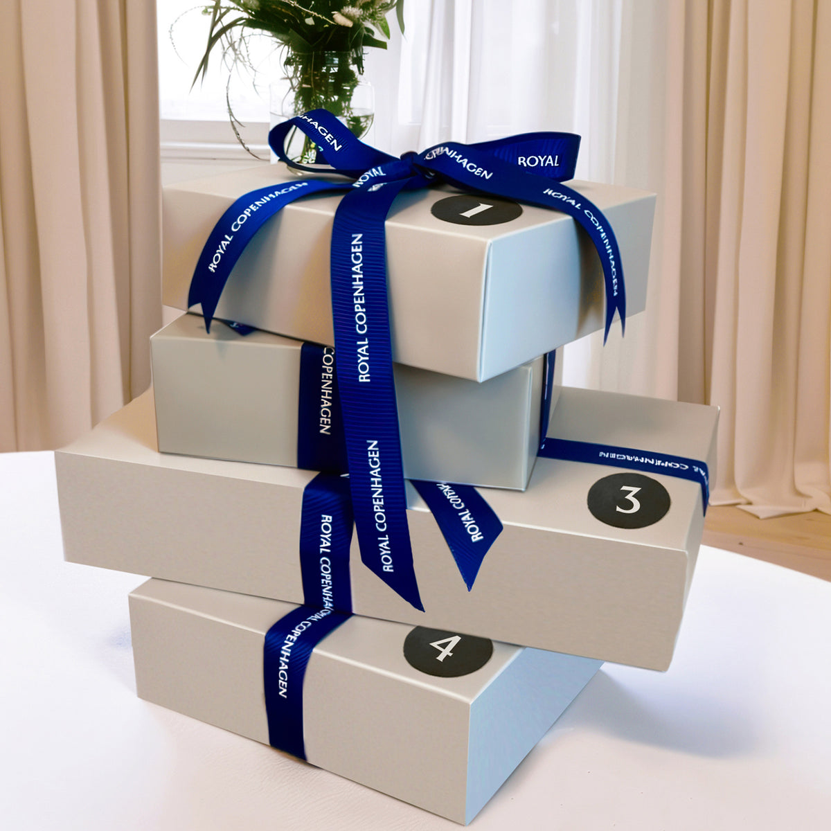 Royal Copenhagen advent calendar 2026 with 4 gifts on a table