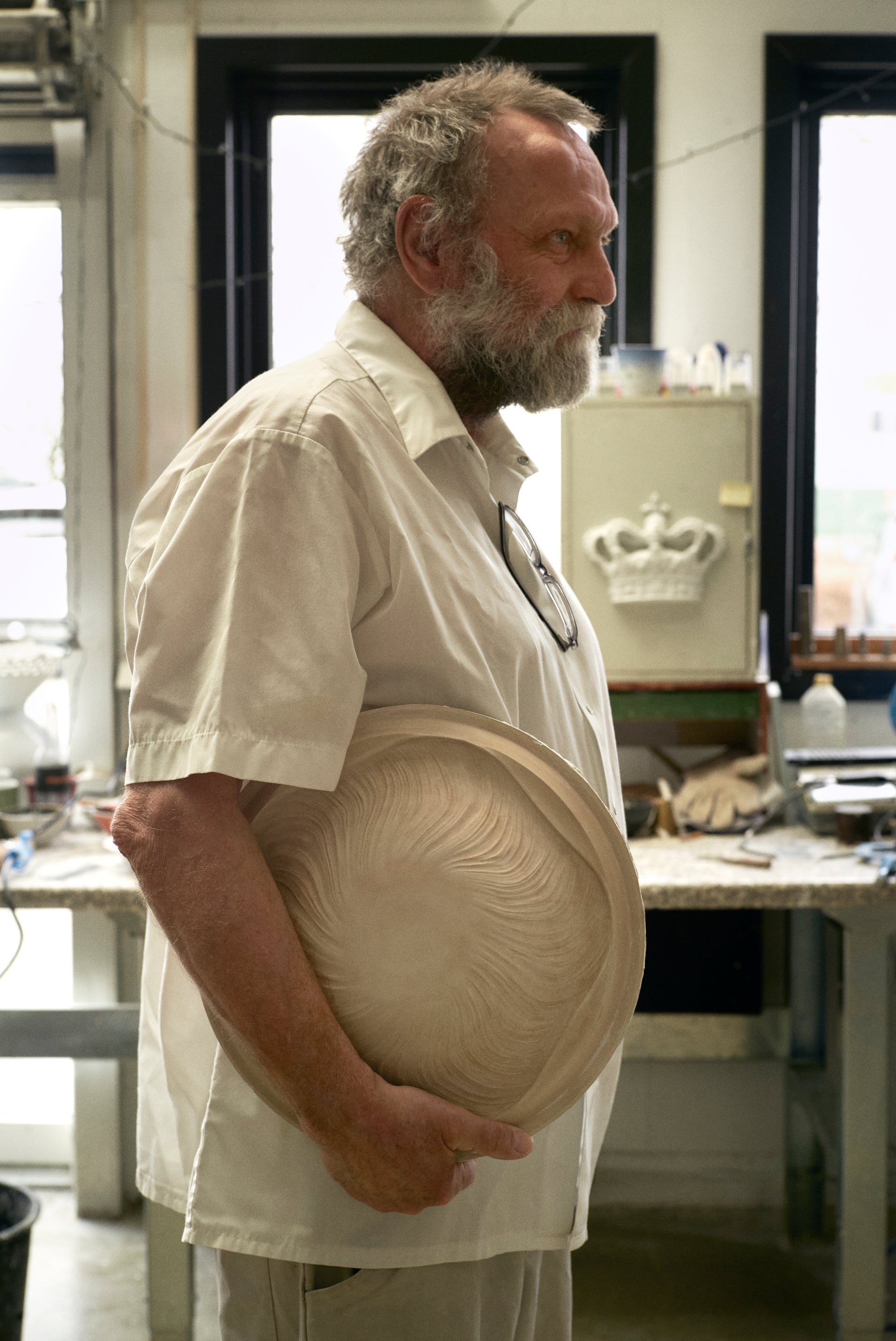 The making of the triton collection - one of the craftsmen holding a mould